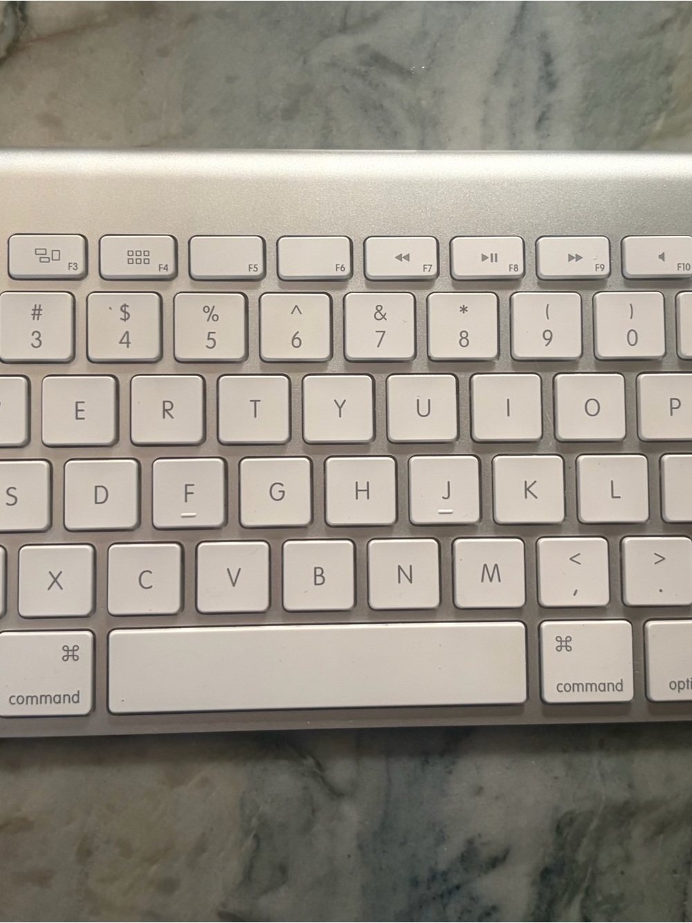 Apple Compact Aluminum Keyboard in Silver and White